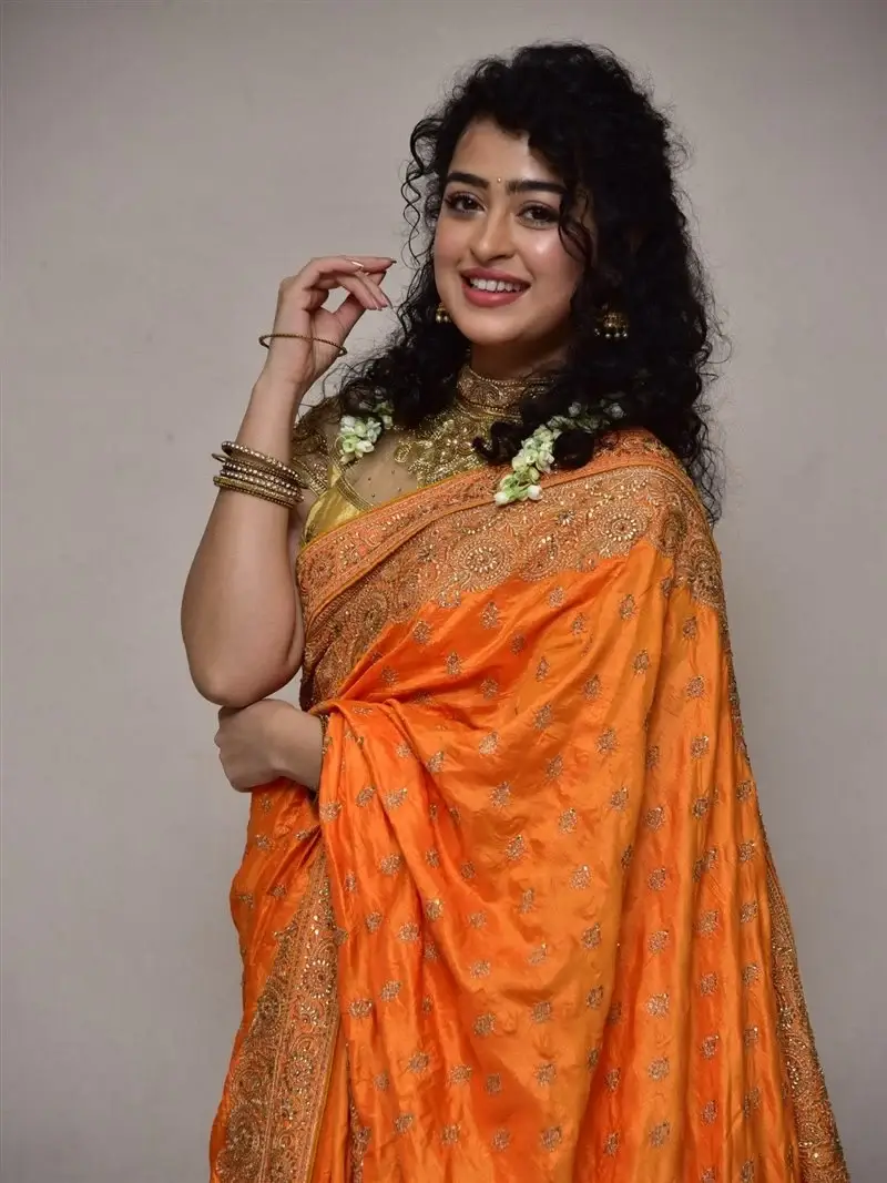 Actress Apsara Rani in Orange Saree at Talakona Movie Launch